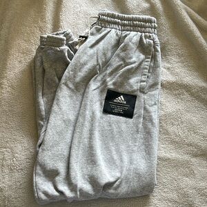 Grey Adidas cuffed sweatpants